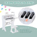 White kids piano keyboard with stool, teaching lights, and microphone toy.