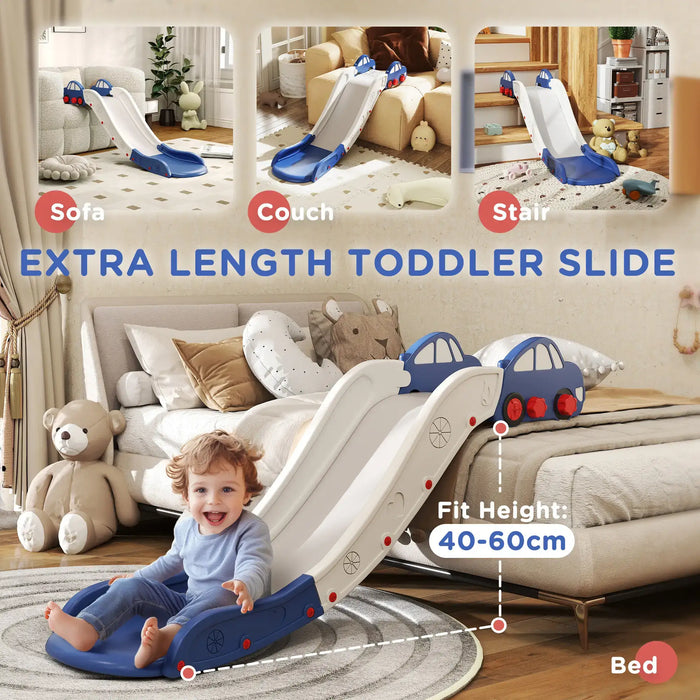 Extra length toddler slide in blue and white attached to bed with a smiling toddler sitting at the bottom on a round rug