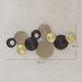 Decorative wall art with circular shapes in gold, black, and beige on a neutral background