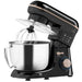 Black stand mixer with silver bowl and whisk attachment on a white background