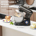 Kitchen stand mixer on a counter with baked goods and ingredients, featuring text about power and ease of use.