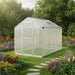 Aluminium frame walk-in greenhouse with double-walled polycarbonate in a flower garden