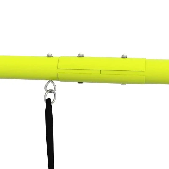 Close-up of green swing set metal frame with bolts and hanging black strap