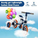 Navy 4-in-1 training balance trike with orange wheels, balloons, and clouds background