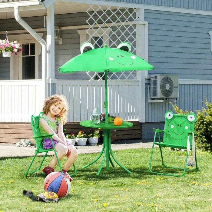 Kids green frog design dining set with chairs, table, and parasol on lawn by a house