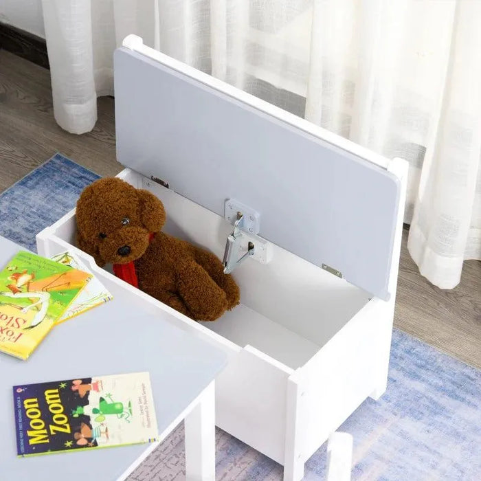 Kids storage bench with U-shaped handle in grey and white, plush bear and books visible