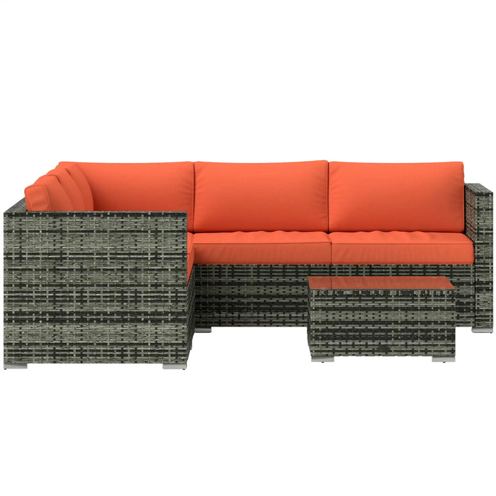 4-piece modular rattan garden sofa set with orange cushions and glass coffee table
