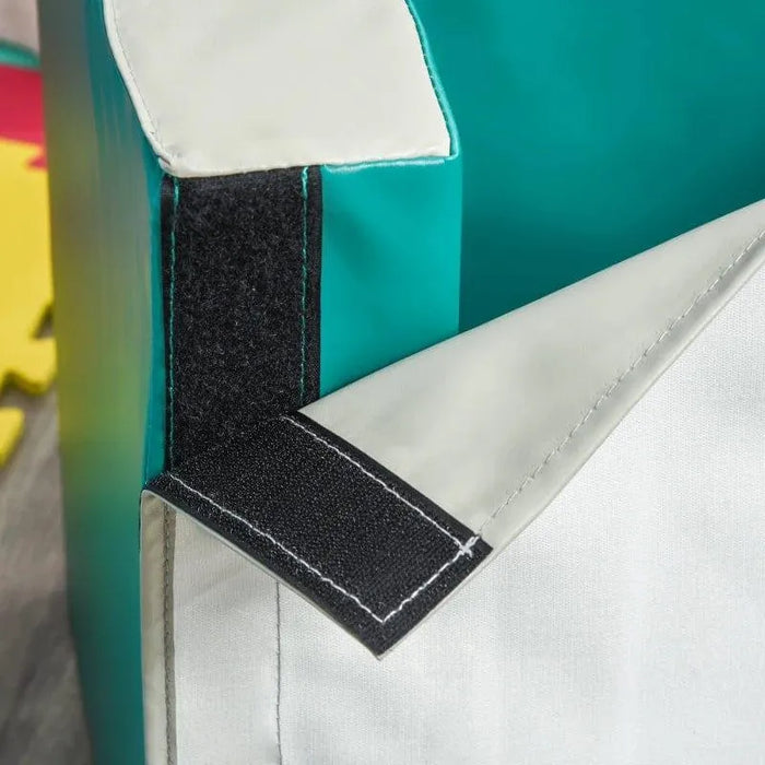 Close-up of a 4-piece soft play set with teal and white velcro fastener detail