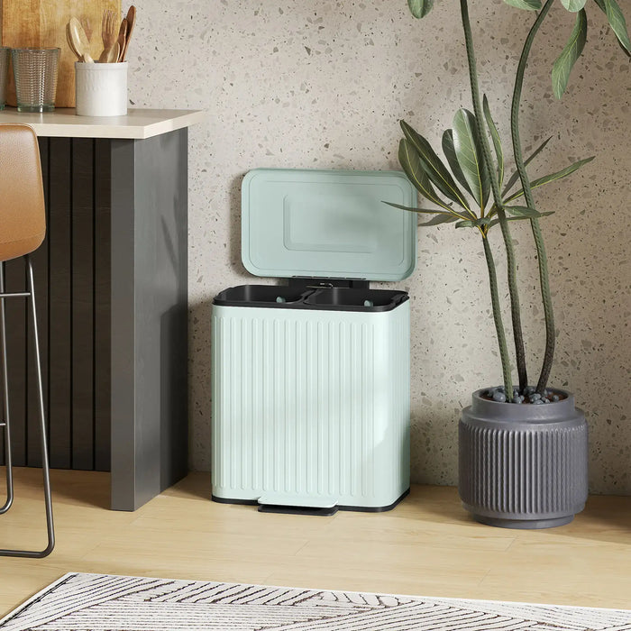 Light green trash bin with black interior in a room with a plant and table.