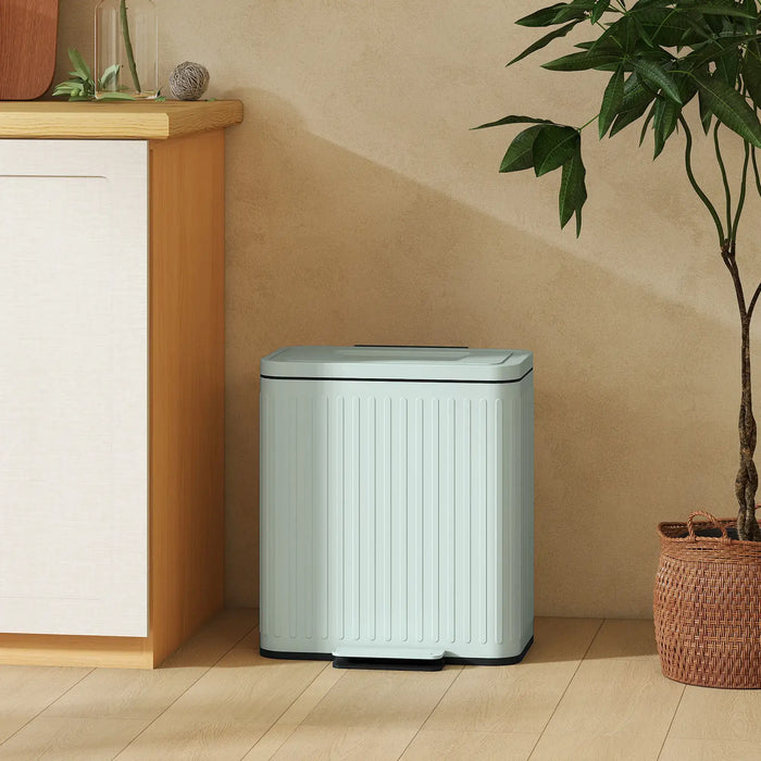 Light green trash bin in a room with a wooden cabinet and plant