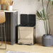 Modern kitchen trash bin with a metallic finish in a home setting.