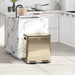 Gold trash can in a modern kitchen with marble island