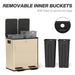 Beige trash bin with removable black inner buckets on a white background
