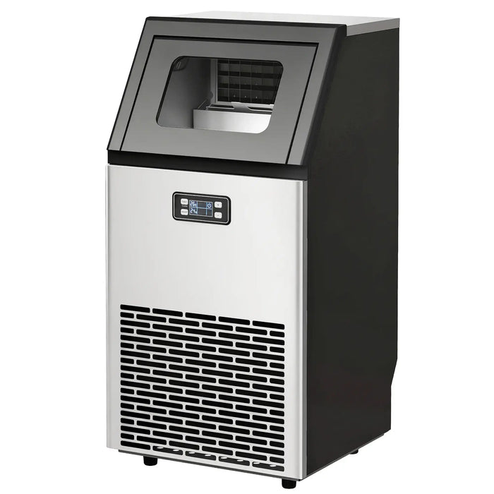 Ice machine with black top and silver front on a white background