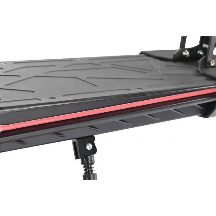 Close-up of 48V folding electric scooter deck with textured black surface and red accent.
