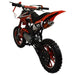 Red kids mini dirt bike with off-road tires and number 27 on rear fender