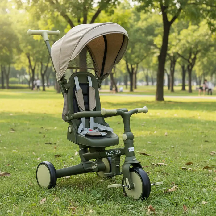 Green and beige tricycle with canopy in a park setting