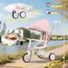 Pink and white children's tricycle with measurements and features on a scenic background