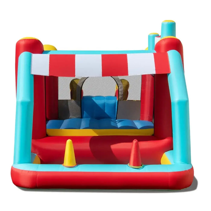 Colorful inflatable bounce house with slide in red, blue, yellow, and turquoise