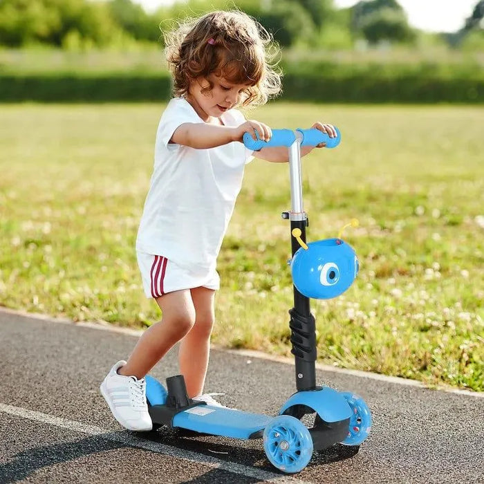 Child riding blue 3-wheel kids kick scooter outdoors on path, sunny park background