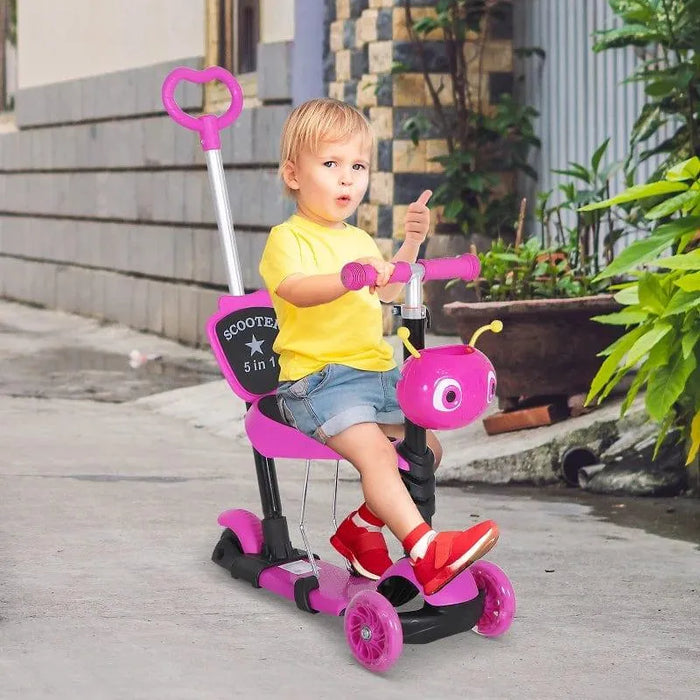 Child riding pink 5-in-1 kids kick scooter with seat and parent handle outdoors
