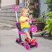 Child riding pink 5-in-1 kids kick scooter with seat and parent handle outdoors