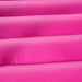 Close-up of pink inflatable bouncy castle steps with textured surface