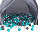 500 baby play balls in white, grey, and mint green inside a grey play tent