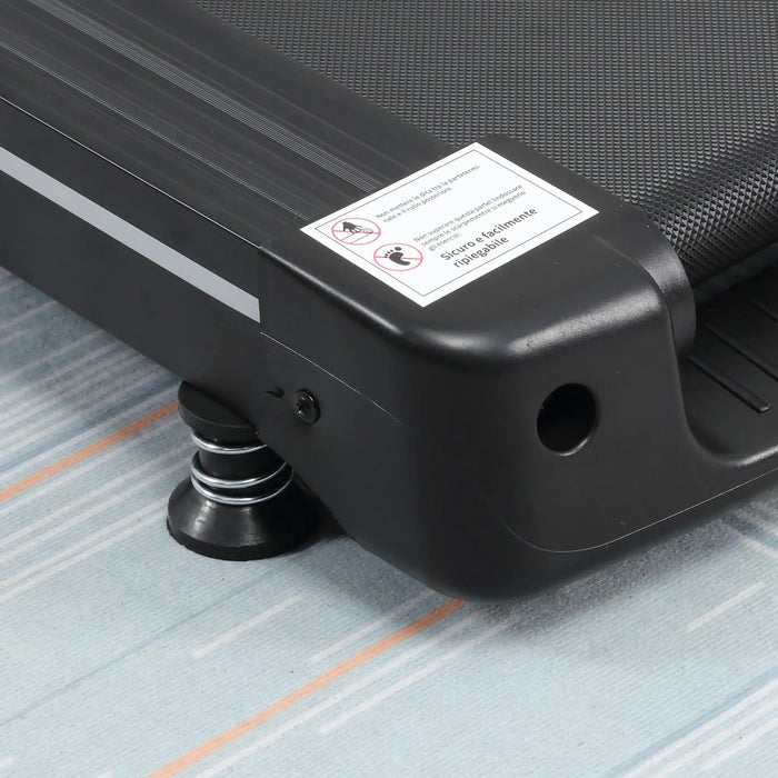 Black suitcase with a label on a textured surface