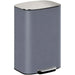 Gray trash can with a metallic lid on a white background