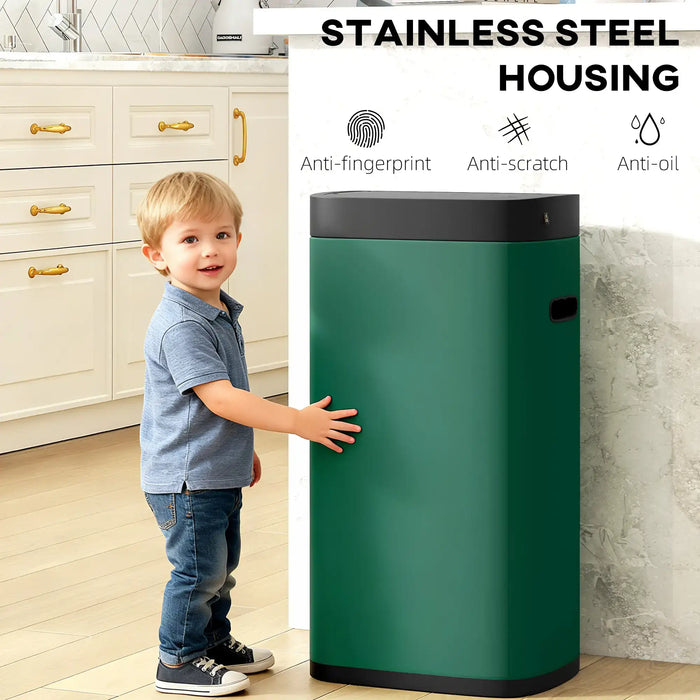 Green touchless sensor trash bin with stainless steel housing and child standing beside it in kitchen