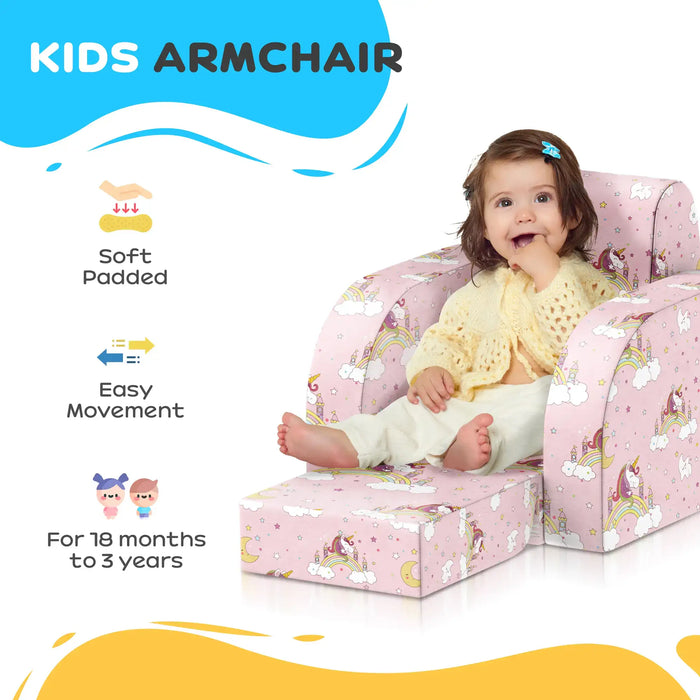 Toddler sitting on pink unicorn-themed kids armchair with soft padded cushion and footrest