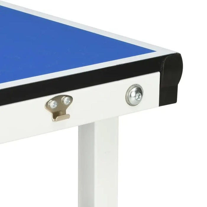 Corner of a blue compact ping pong table with white frame and metal latch