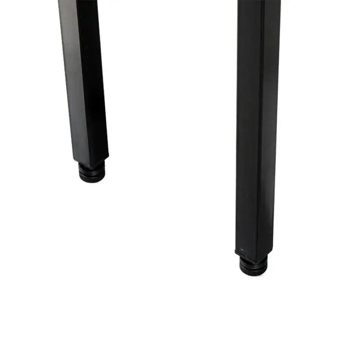 Close-up of black metal table tennis table legs on white background