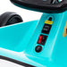 Close-up of a teal toy car with control buttons on a white background