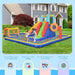 Kids playing on a giant inflatable water park with slide, ball pit, and sports zones in a backyard.