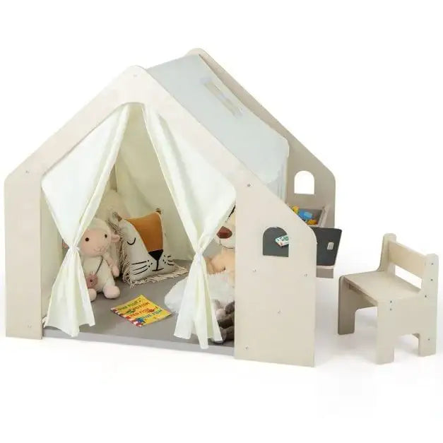 Montessori-inspired indoor playhouse with soft toys, books, and a small wooden bench
