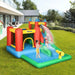 Kids playing on Outsunny inflatable bouncy castle water slide with pool and water gun in backyard