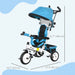 Blue and white baby tricycle with canopy on a light blue background
