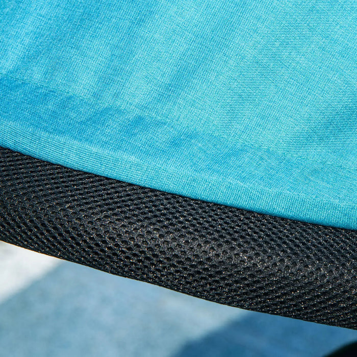 Close-up of blue fabric with black mesh trim