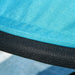Close-up of blue fabric with black mesh trim