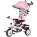 Pink and gray baby tricycle with canopy on a white background