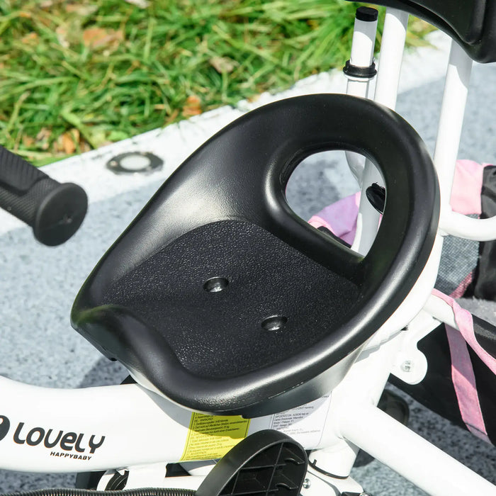 Close-up of a stroller seat with 'Lovely' branding on a grassy background