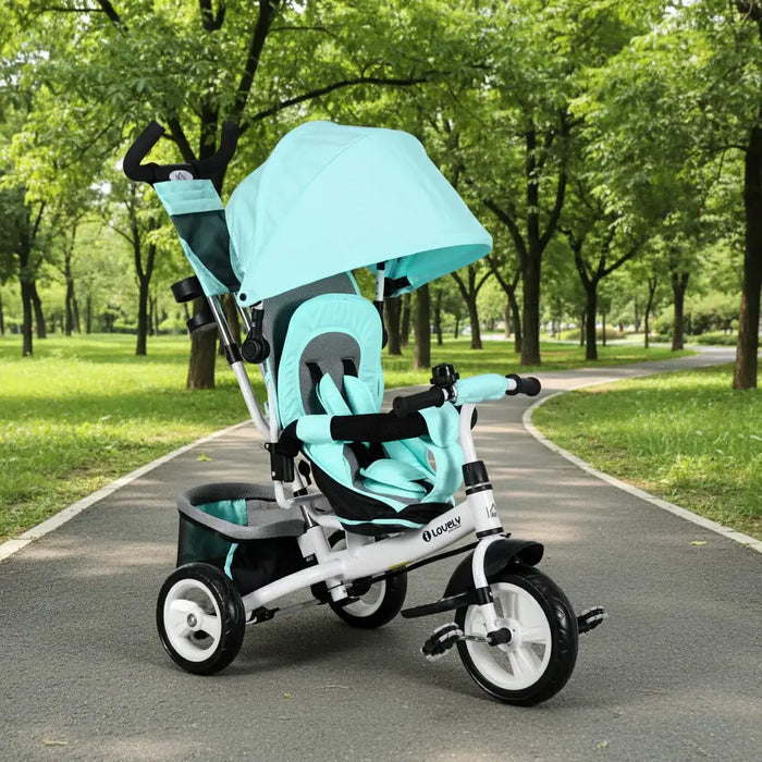 Turquoise children's tricycle on a paved path in a park