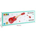 SOKA kids red 6-string acoustic guitar in box, 53cm beginner musical toy, packaging front view