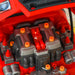 Close-up of red plastic toy car engine from a kids engine workshop playset