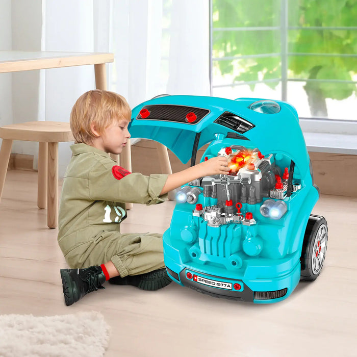 Child playing with teal kids engine toy set in modern room, vehicle maintenance role play