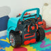 Teal kids engine toy set with dashboard and steering wheel on colorful play mat