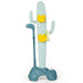 Toy cactus with yellow buttons on a white background