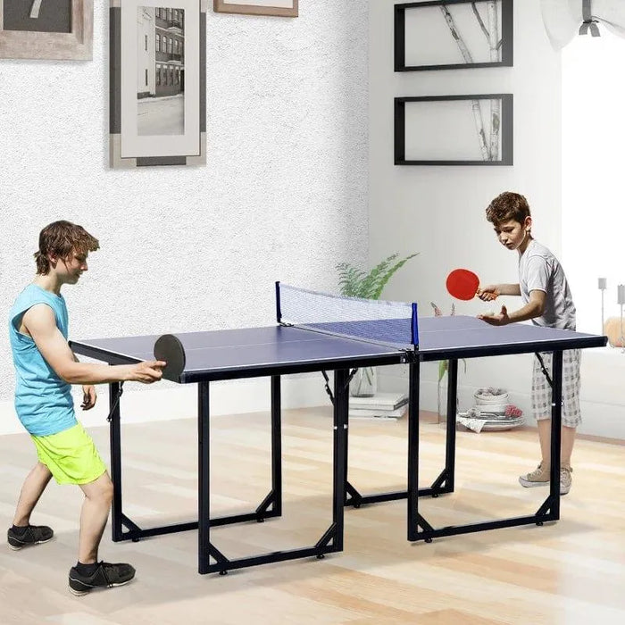 Kids playing table tennis on a blue 6ft split-design indoor ping pong table